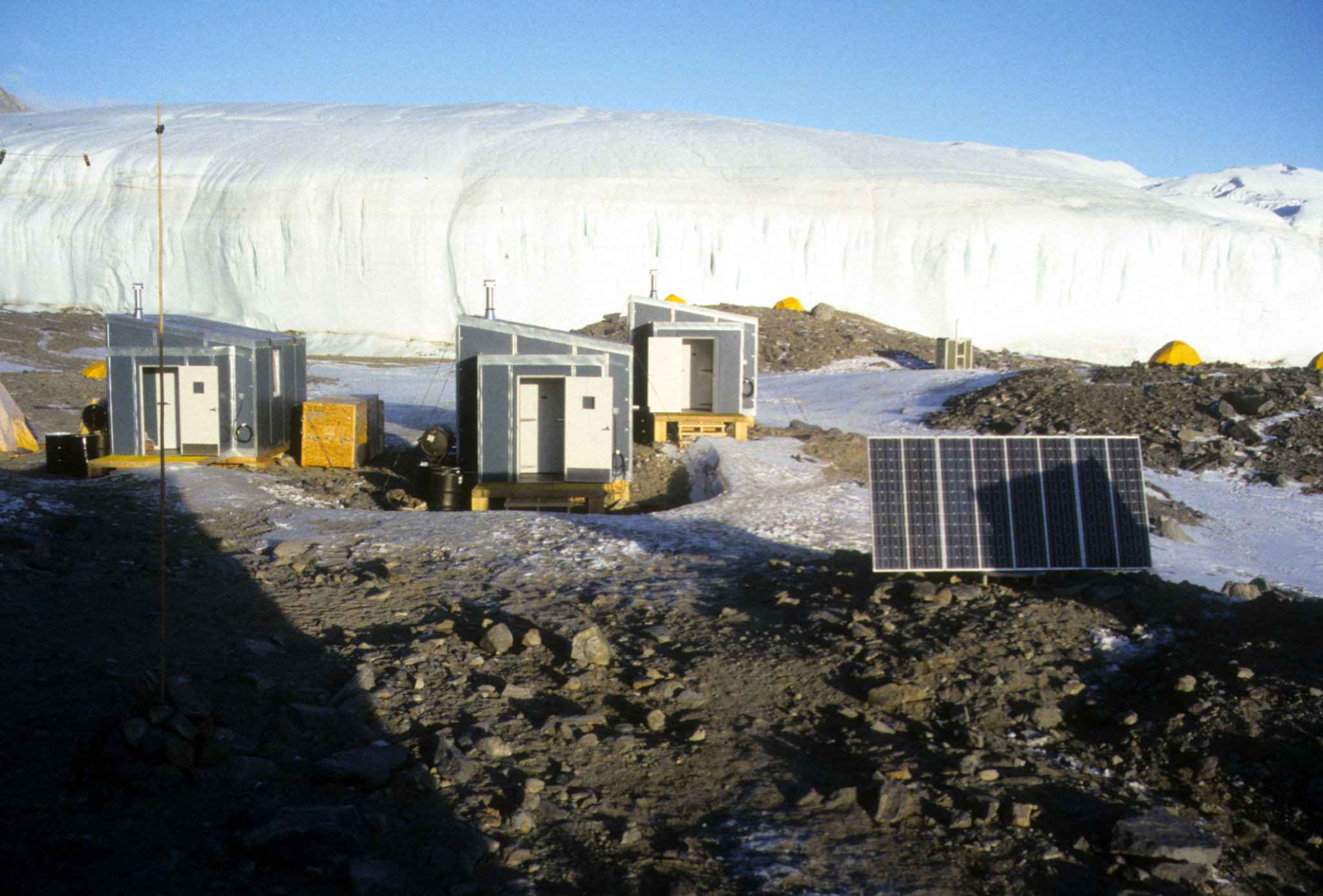 Laboratory huts and sleeping tents next to Canada Glacier at Lake Hoare